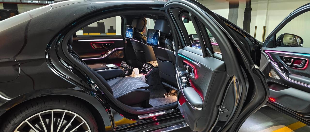 Executive sedan DWC airport transfer — Luxury Chauffeurs Dubai