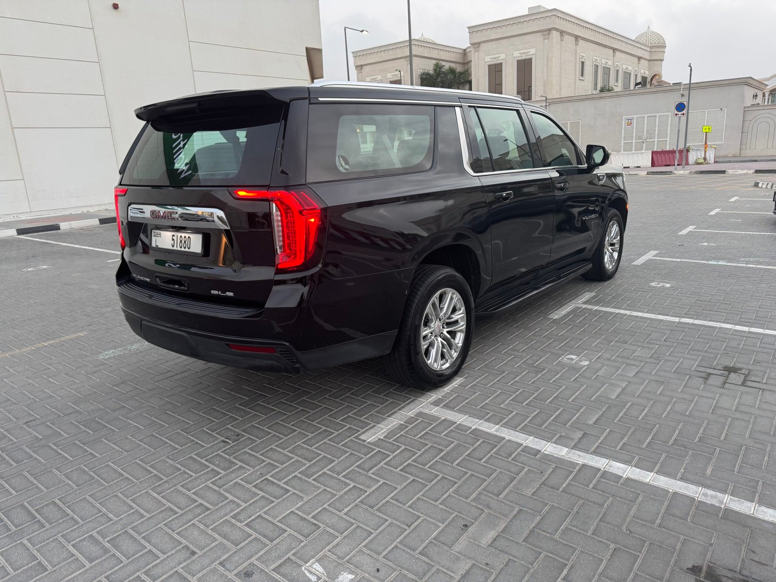 GMC Yukon XL with chauffeur driver