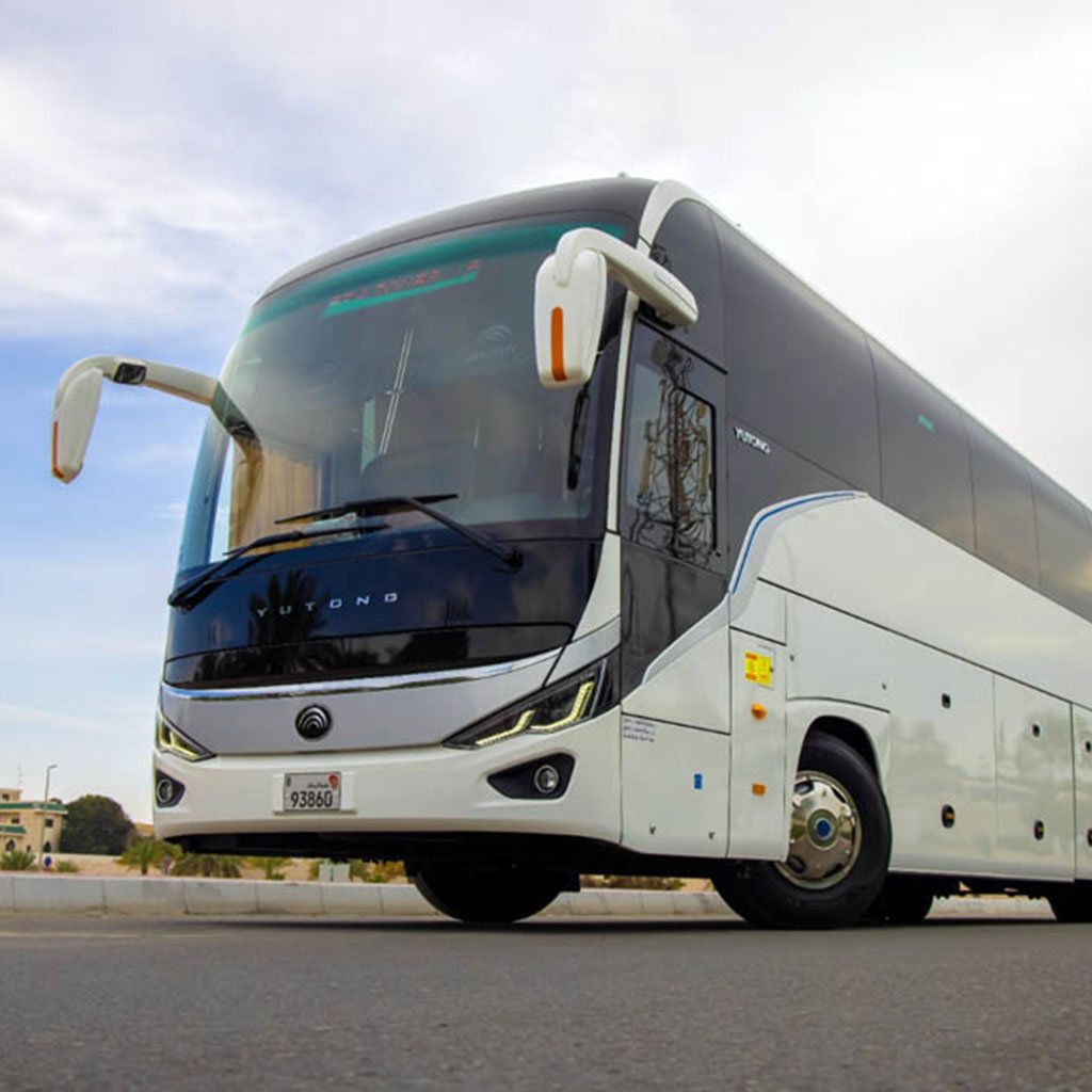 Luxury chauffeur airport transfer service in Dubai — professional driver waiting at Dubai International Airport